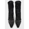 Black boots with a sharp toe