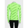 A fitted long sleeve top with a signature print