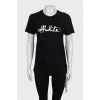 Black T-shirt with branded print and tag