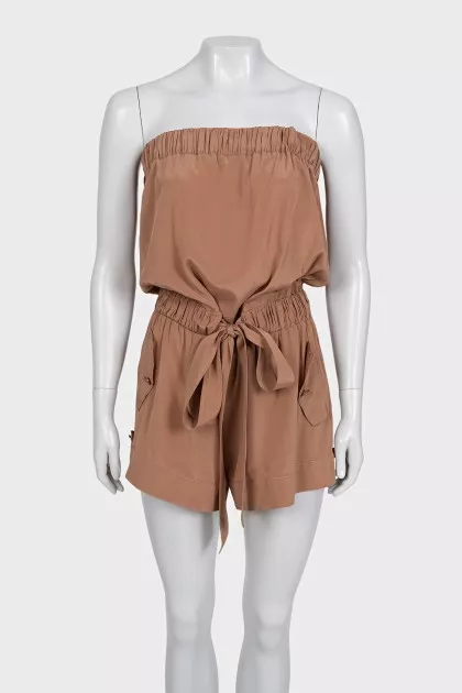 Brown jumpsuit with an open top