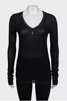 Black pullover decorated with lace