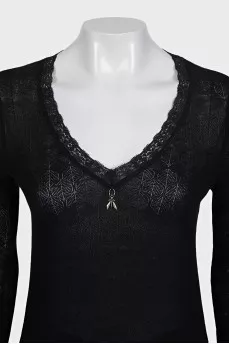 Black pullover decorated with lace