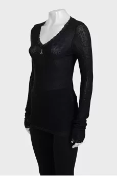 Black pullover decorated with lace
