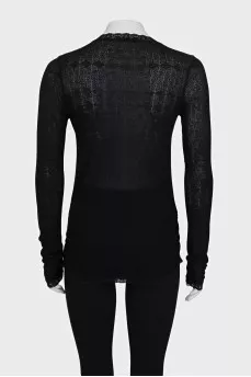 Black pullover decorated with lace