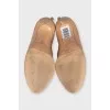 Beige leather open-toe shoes