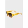 Sunglasses with yellow frames