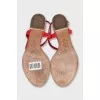 Red sandals with metallic decor