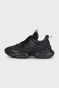 Black leather sneakers with shiny inserts