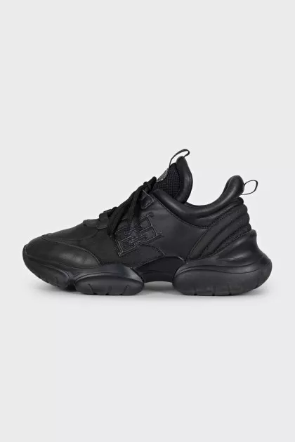 Black leather sneakers with shiny inserts