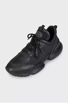 Black leather sneakers with shiny inserts