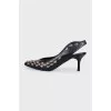 Black slingbacks with metallic decor