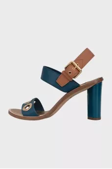 Leather sandals with a gold eyelet