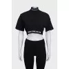 Black top with embroidery on the collar