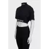 Black top with embroidery on the collar