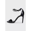 Leather sandals with decorated straps