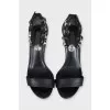 Leather sandals with decorated straps