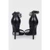 Leather sandals with decorated straps