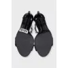 Leather sandals with decorated straps