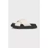 Beige leather flip-flops