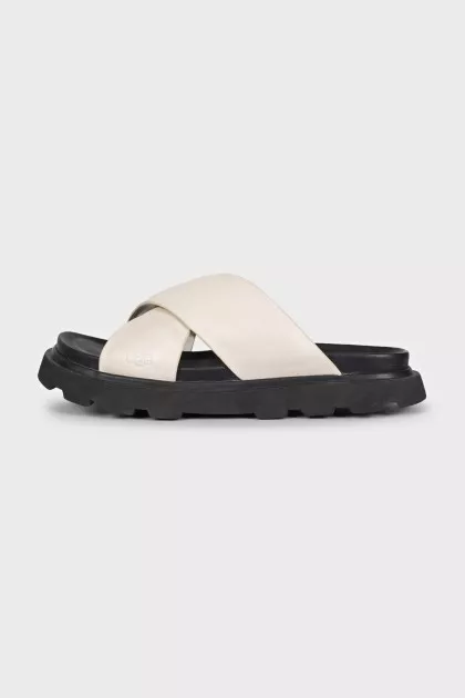 Beige leather flip-flops