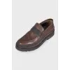 Brown loafers with leather decor