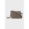 Rectangular bag made of gray suede
