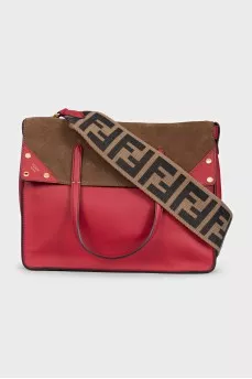 Leather bag with a belt in a signature print