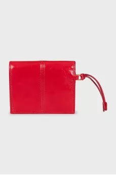 Leather wallet with a button
