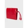 Leather wallet with a button
