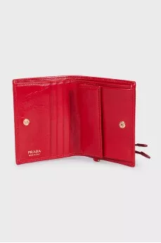 Leather wallet with a button