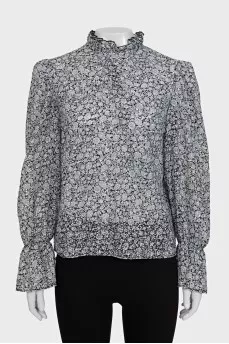 Black floral print blouse with ruffles