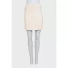 Suit with a beige jacket and skirt