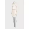 Suit with a beige jacket and skirt