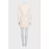 Suit with a beige jacket and skirt