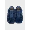 Blue sneakers decorated with fur