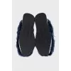 Blue sneakers decorated with fur