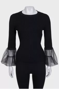 Black jumper with tulle sleeves