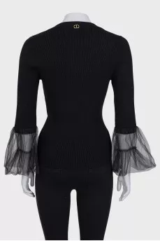 Black jumper with tulle sleeves
