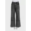 Black jeans decorated with rhinestones