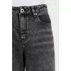 Black jeans decorated with rhinestones