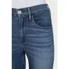 Blue jeans with fringe on the legs