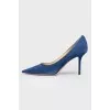 Blue sucking shoes on a stiletto