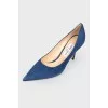 Blue sucking shoes on a stiletto