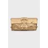 Gold embossed leather clutch