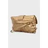 Gold embossed leather clutch
