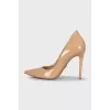 Beige leather pumps