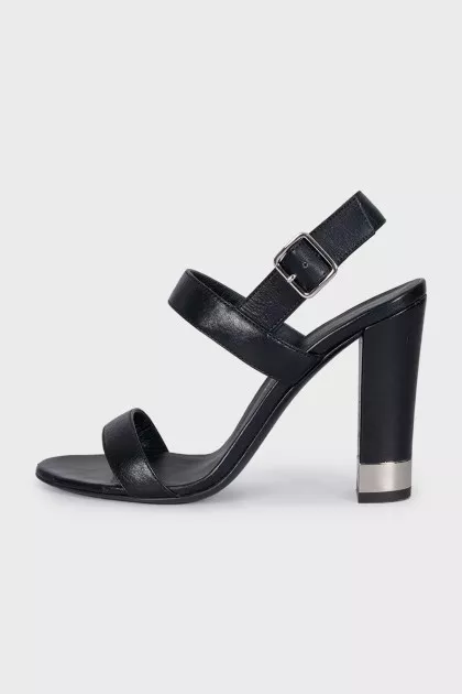 Black leather heeled sandals with silver hardware