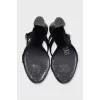 Black leather heeled sandals with silver hardware
