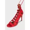 Red suede lace-up sandals