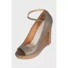 Gray shoes with wooden wedge heels